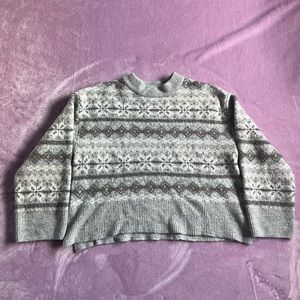 Gently loved grey sweater with gold and silver details.